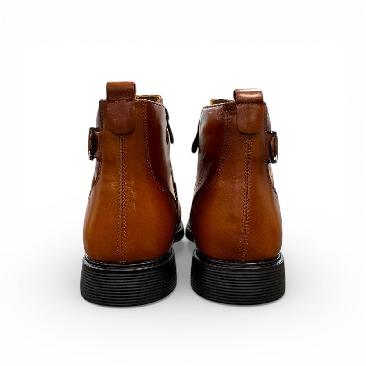 Brown leather ankle boots with a side buckle strap and durable rubber sole for formal wear. Photo of back view.