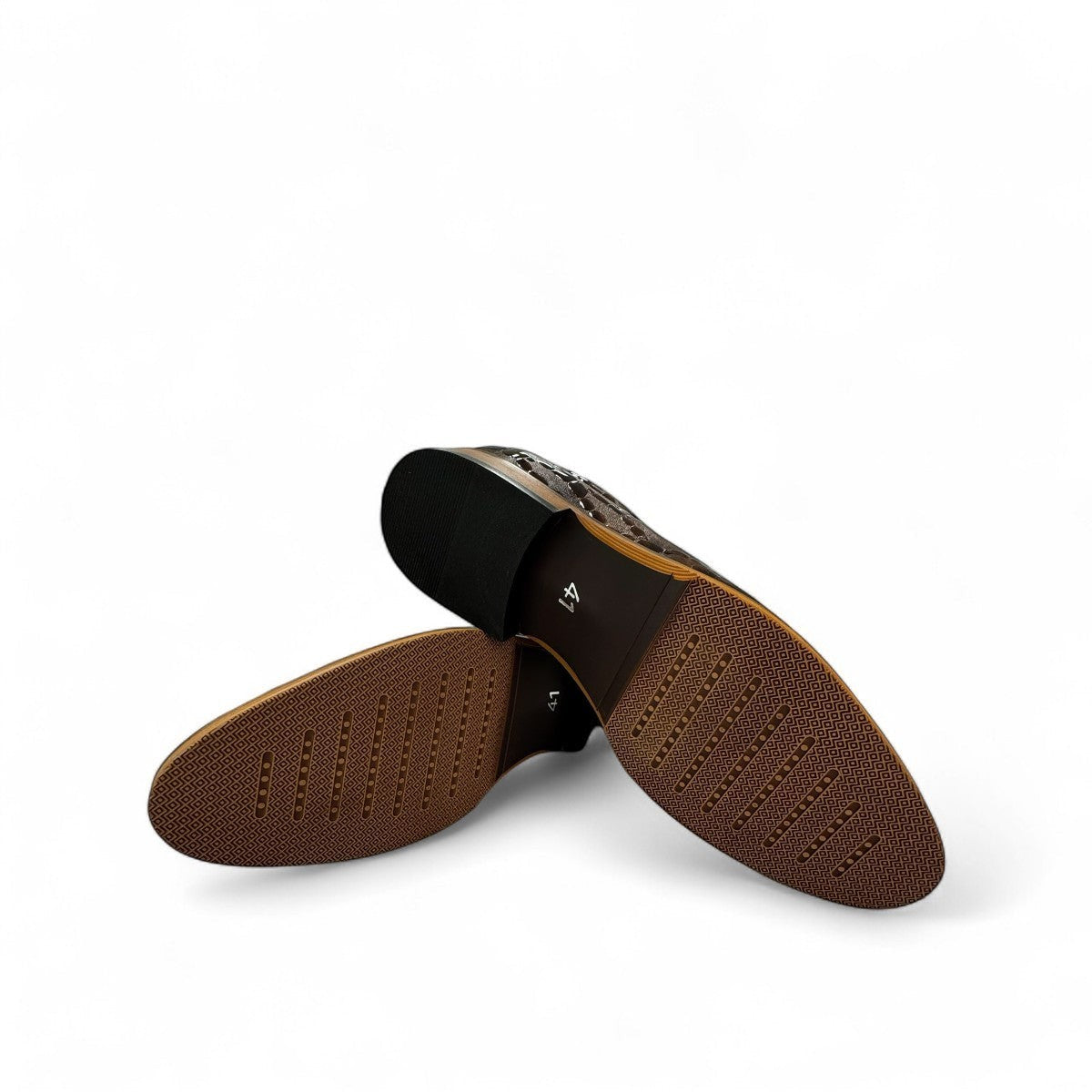 Atropat Diyan brown marble leather loafers with handmade stitching and durable rubber outsole. Photo of bottom view.