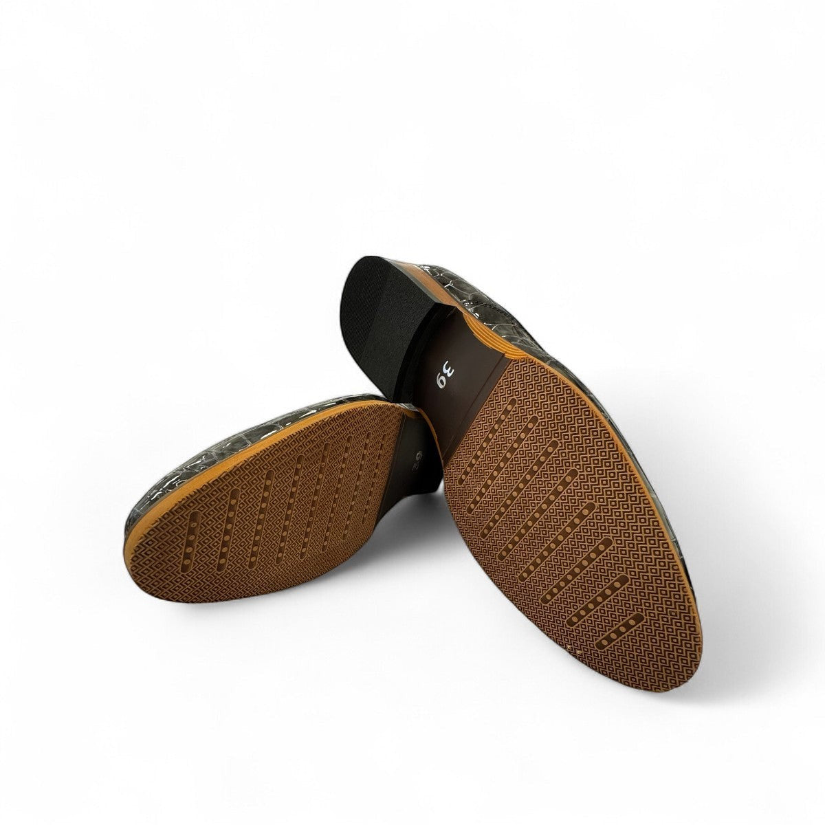 Atropat Diyan grey marble patent leather slip-on dress shoe with a durable rubber outsole. Photo of bottom view.