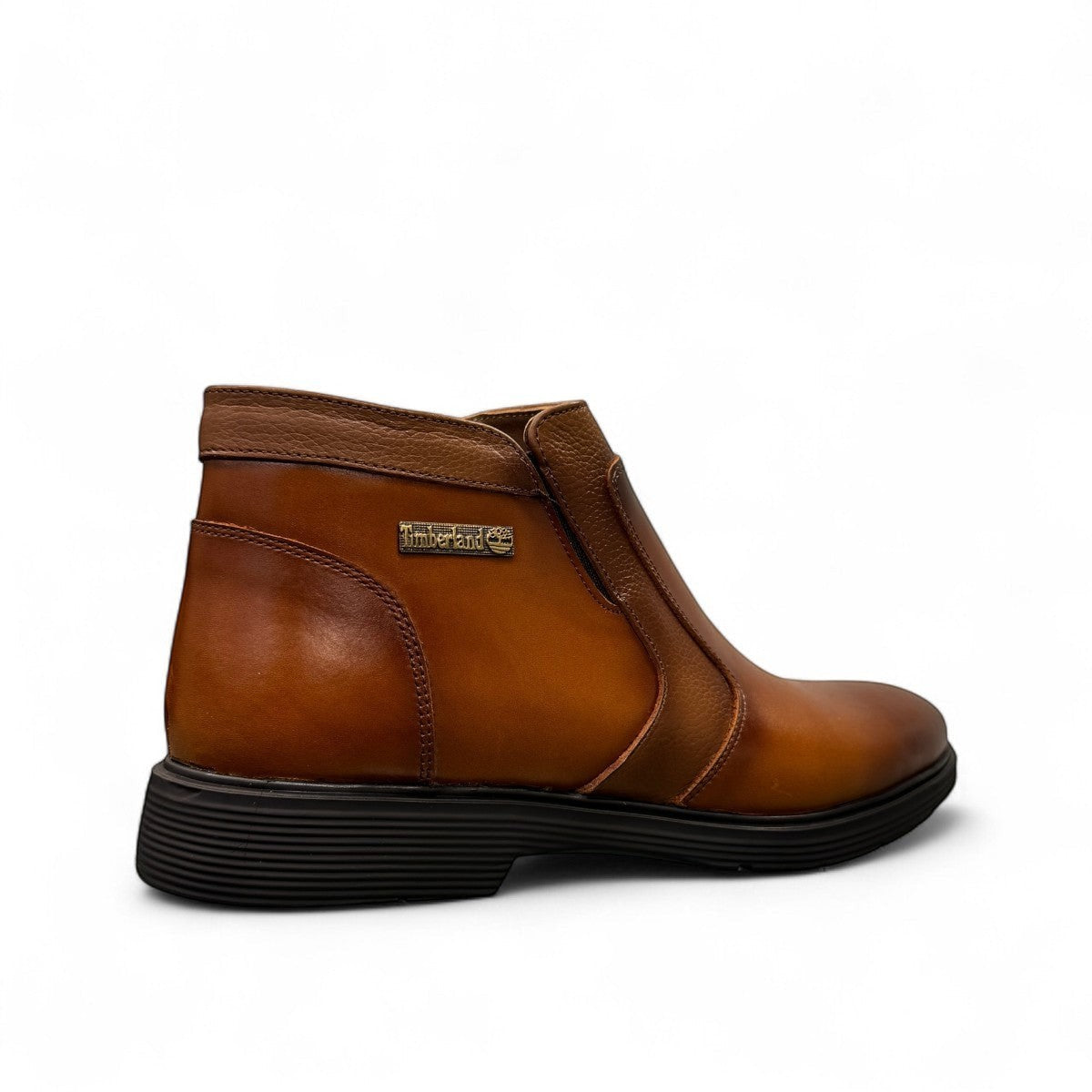 Atropat Nezami 2 brown genuine leather ankle boots with handmade stitching and rubber outsole. Photo of side view from the back.