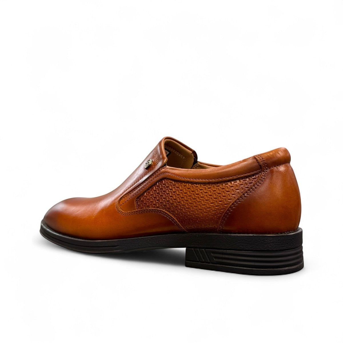 Atropat Parsa brown leather slip-on dress shoe with textured side panel and rubber outsole. Photo of side view from the back.