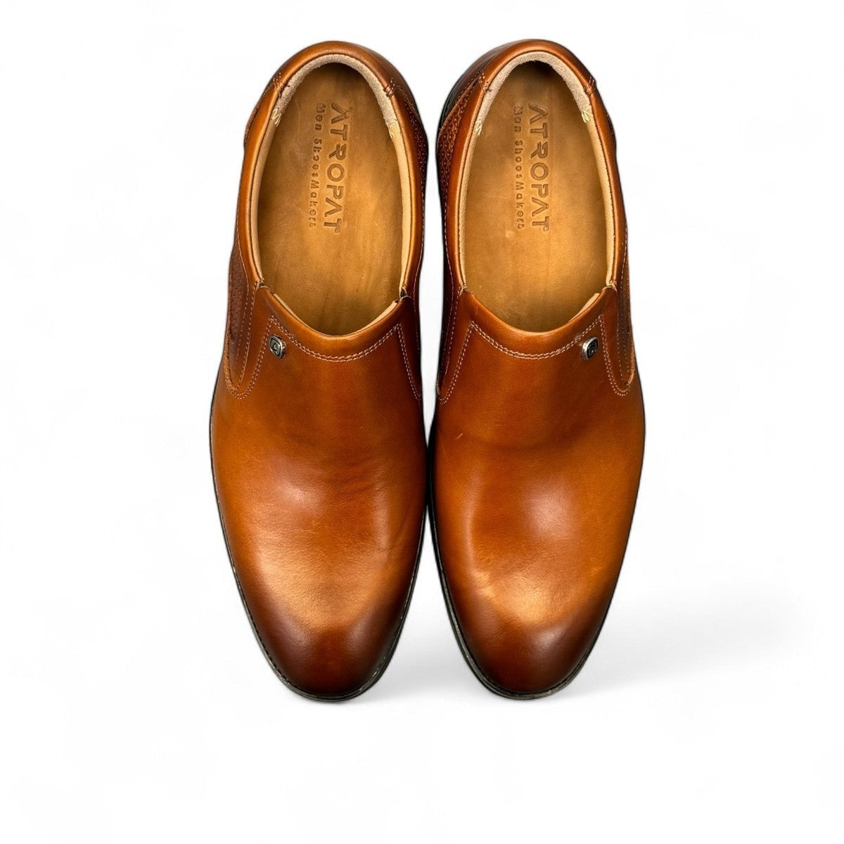 Atropat Parsa brown leather slip-on dress shoe with textured side panel and rubber outsole. Photo of the soles.