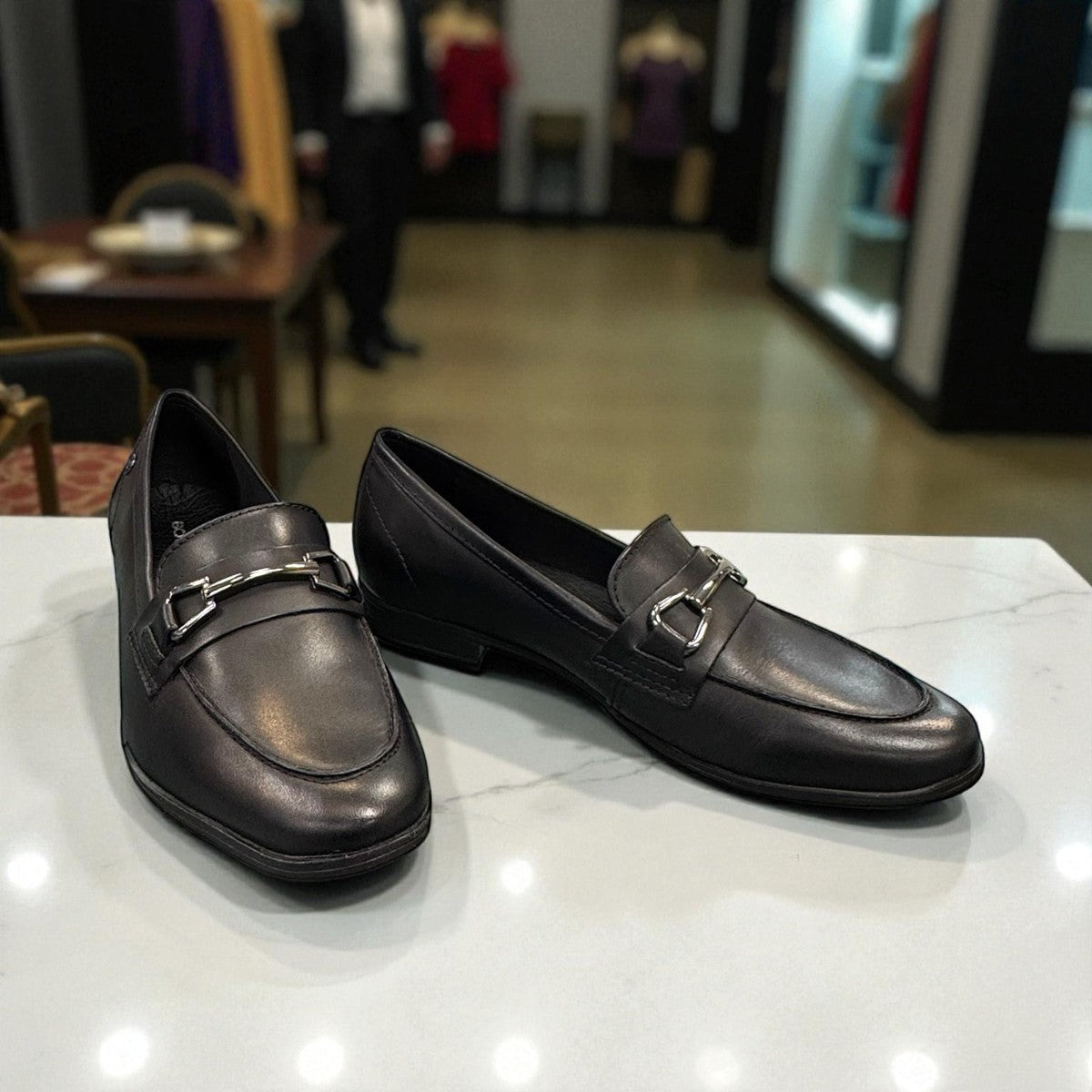 Bottero  black leather loafers with a metal horsebit detail and a classic slip-on silhouette.