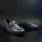 Bottero navy leather loafer with a metal horsebit detail and a low flat heel in a classic slip-on style