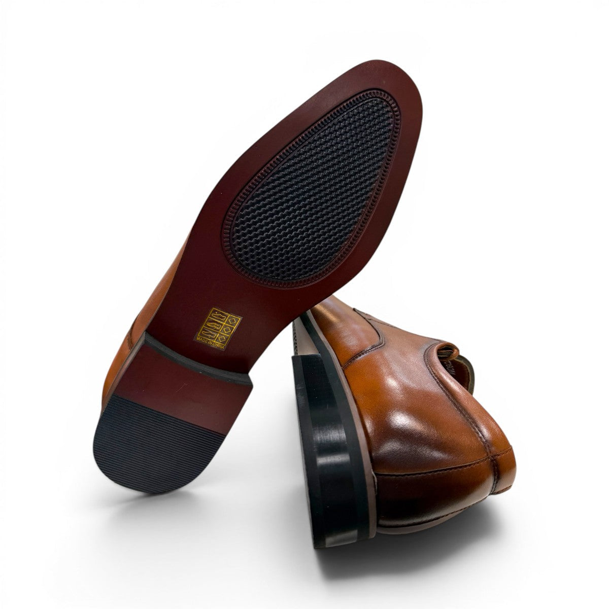 COLLEXION-F7067M brown leather lace-up dress shoe with a sleek formal silhouette for business and special occasions.
photo of the bottom side