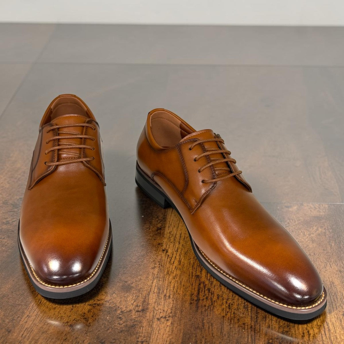 COLLEXION-F7067M brown leather lace-up dress shoe with a sleek formal silhouette for business and special occasions.
photo of the front side