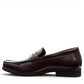 COLLEXION F7067M coffee brown leather penny loafer with a classic slip-on design.
photo of the left side