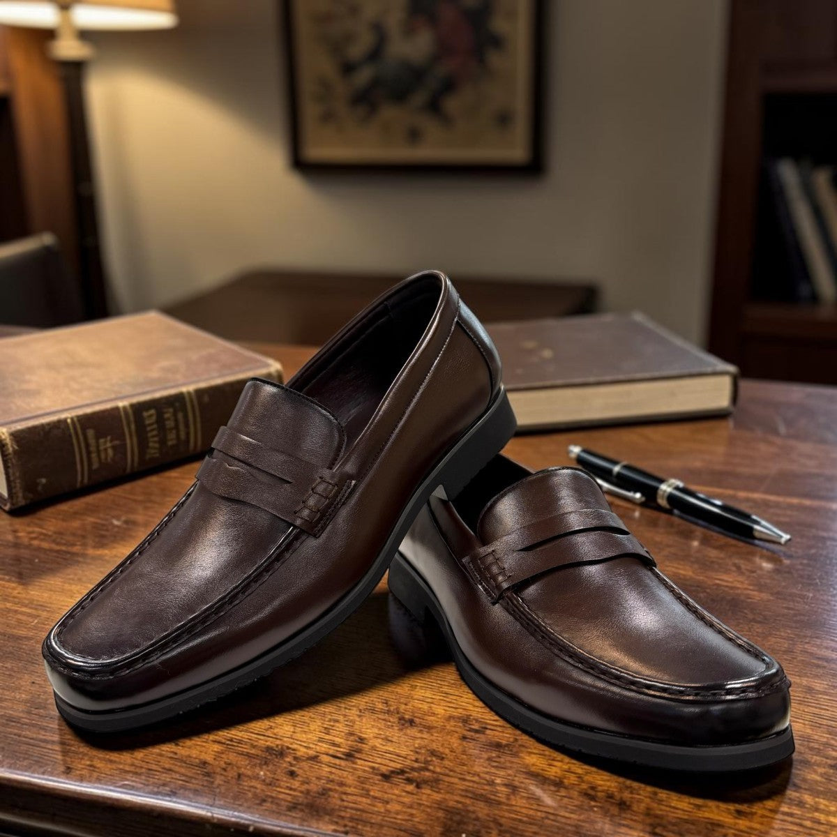COLLEXION F7067M coffee brown leather penny loafer with a classic slip-on design.
photo of the front side