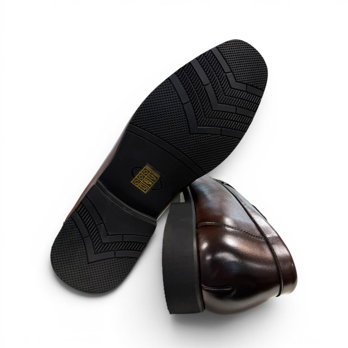 COLLEXION F7067M coffee brown leather penny loafer with a classic slip-on design.
photo of the bottom side