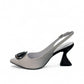 Capelli Rossi Claire white leather slingback heels with black sculptural heel and decorative accent