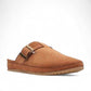 Clarks tan suede Brookleigh mule with faux shearling lining and chunky buckle detail.photo of the front.