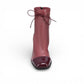 Django & Juliette burgundy leather ankle boots with a black patent square toe, block heel, and lace detail. front view