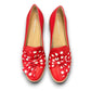 DJANGO & JULIETTE red leather platform loafers with white polka dot bow detail and white rubber wedge.
top view.