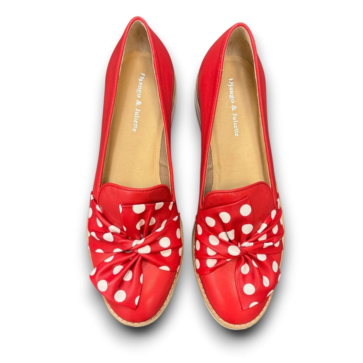 DJANGO & JULIETTE red leather platform loafers with white polka dot bow detail and white rubber wedge.
top view.