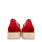 DJANGO & JULIETTE red leather platform loafers with white polka dot bow detail and white rubber wedge.
back view.