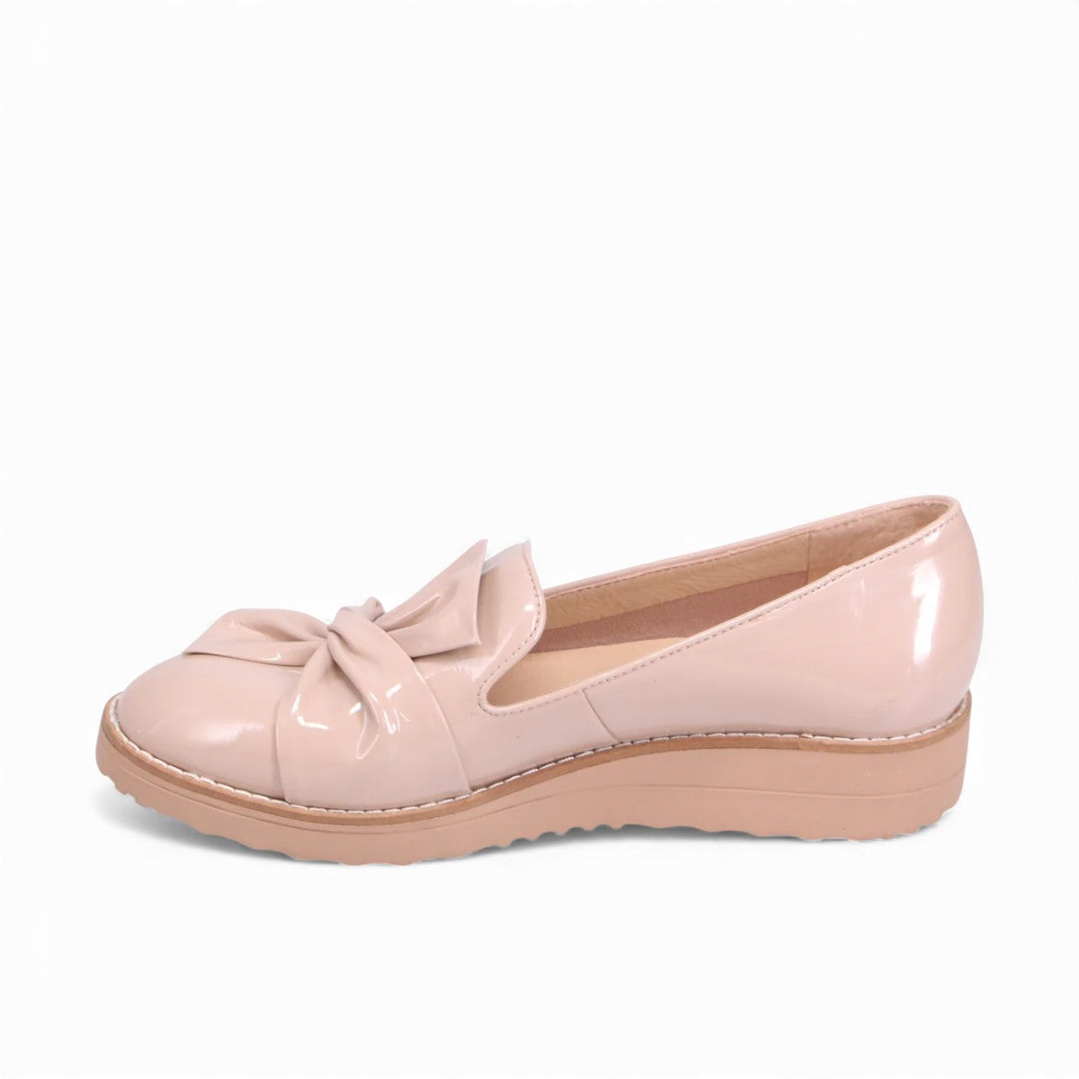 DJANGO & JULIETTE OCLEM cappuccino patent leather platform loafers with a bow detail and low wedge sole. left side.