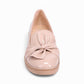 DJANGO & JULIETTE OCLEM cappuccino patent leather platform loafers with a bow detail and low wedge sole. front view
