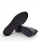 DJANGO & JULIETTE OCLEM navy leather platform loafers with a sporty rubber wedge sole and slip-on design. BOTTOM VIEW