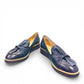 DJANGO & JULIETTE OCLEM navy leather platform loafers with a sporty rubber wedge sole and slip-on design. front view.