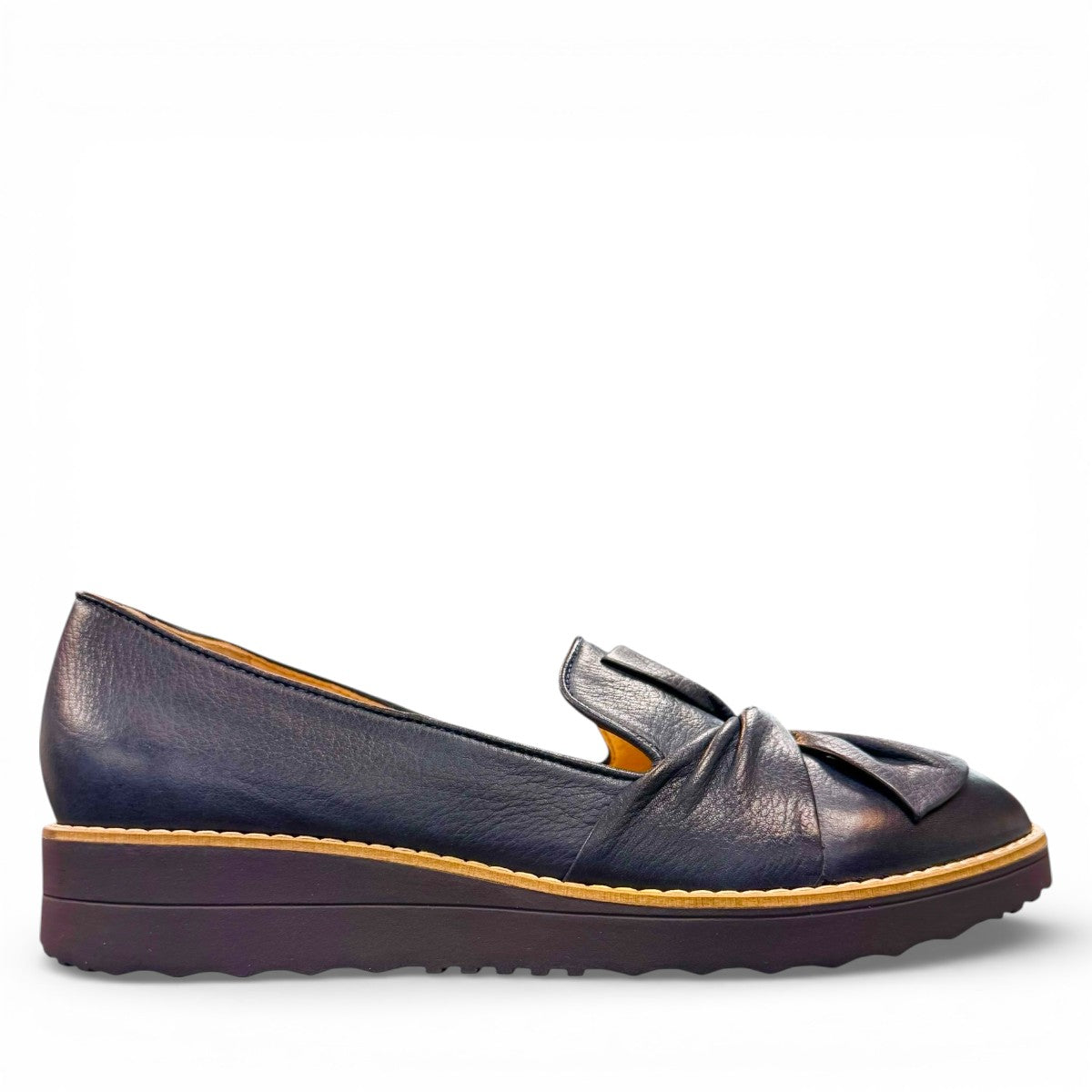 DJANGO & JULIETTE OCLEM navy leather platform loafers with a sporty rubber wedge sole and slip-on design. right view.
