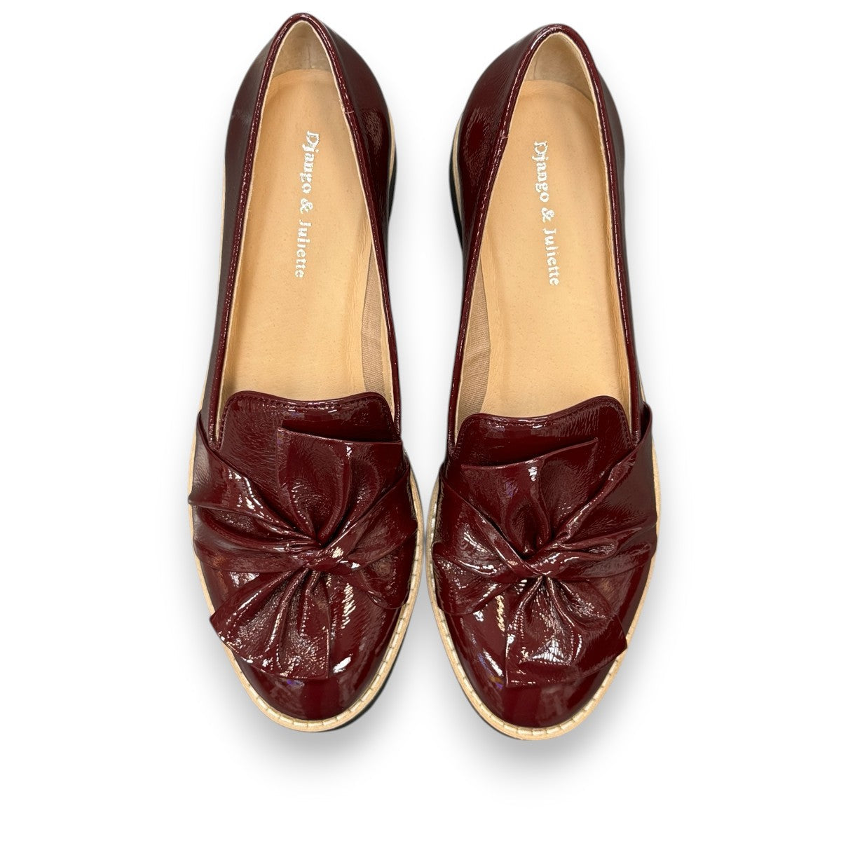 DJANGO & JULIETTE OCLEM wine patent leather platform loafers with a black rubber wedge sole. top view.