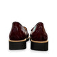 DJANGO & JULIETTE OCLEM wine patent leather platform loafers with a black rubber wedge sole. back view.