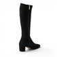 Django & Juliette black microsuede knee-high boots with square toe, block heel, and gold buckle detail.
photo of the back side
