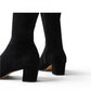 Django & Juliette black microsuede knee-high boots with square toe, block heel, and gold buckle detail.
photo of the back side