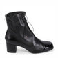 Django & Juliette Valina black leather ankle boots with patent toe, block heel, and lace-up detail. Photo of right side view.