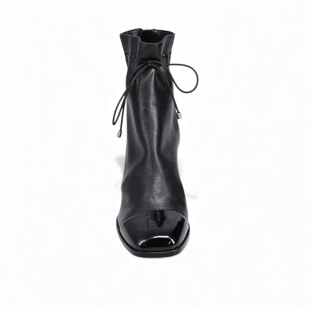 Django & Juliette Valina black leather ankle boots with patent toe, block heel, and lace-up detail. Photo of upper view.