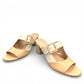 Django & Juliette Conrade camel and almond leather heeled mule sandals with a decorative buckle. Photo of front side view 1.