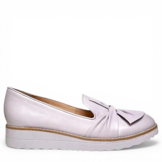 DJANGO & JULIETTE lilac leather platform loafers with a sporty rubber wedge sole and slip-on design. Photo of right side view.