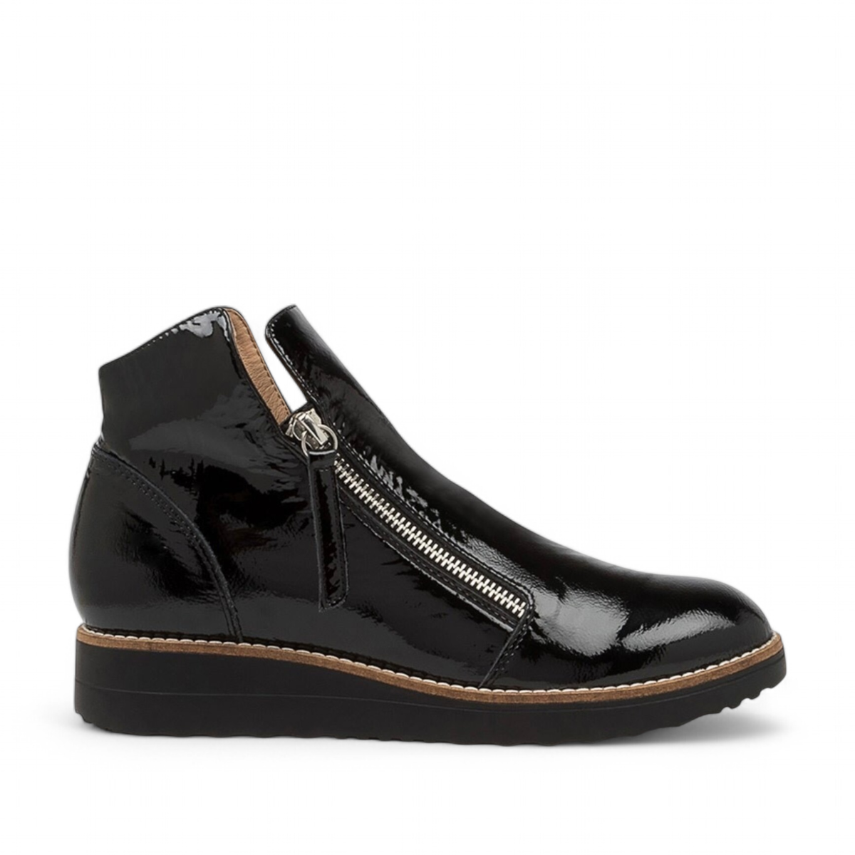 DJANGO & JULIET black patent leather ankle boots with asymmetrical front zip and low wedge heel. Photo of right side view.