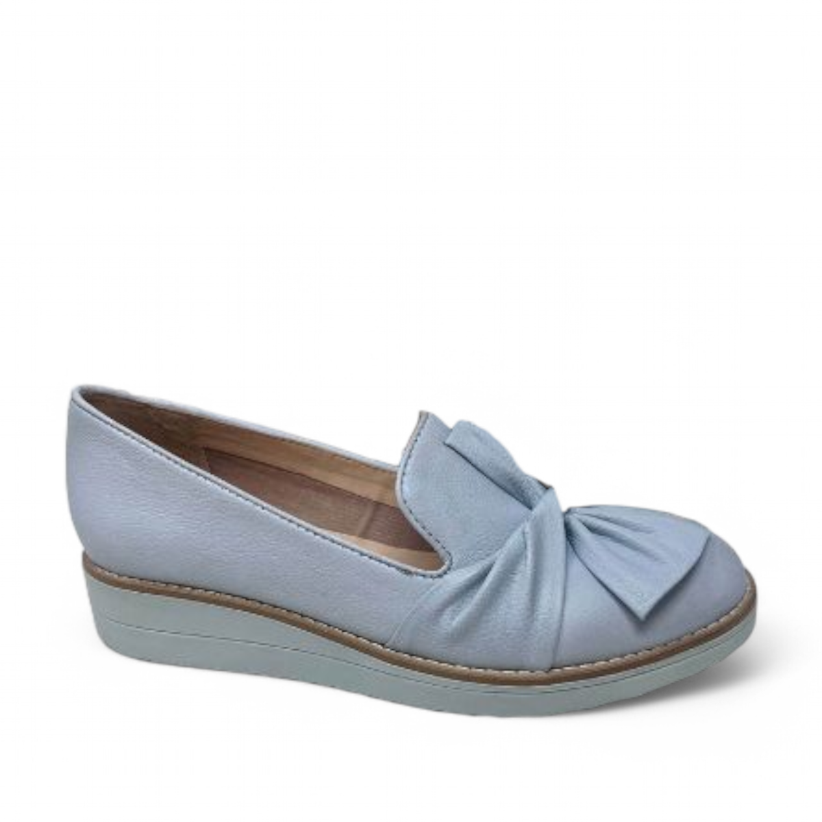 DJANGO & JULIETTE pale blue leather platform loafers with a bow detail and sporty rubber wedge sole. Photo of right side view.