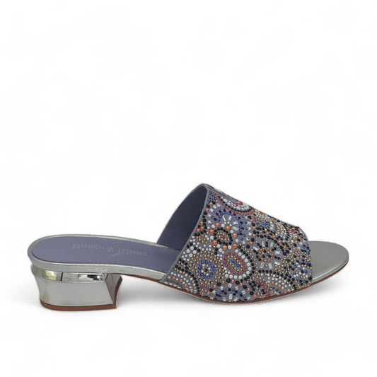 Django & Juliette Tammy denim blue mule with retro patterned beadwork and a metallic low block heel. Photo of right side view.
