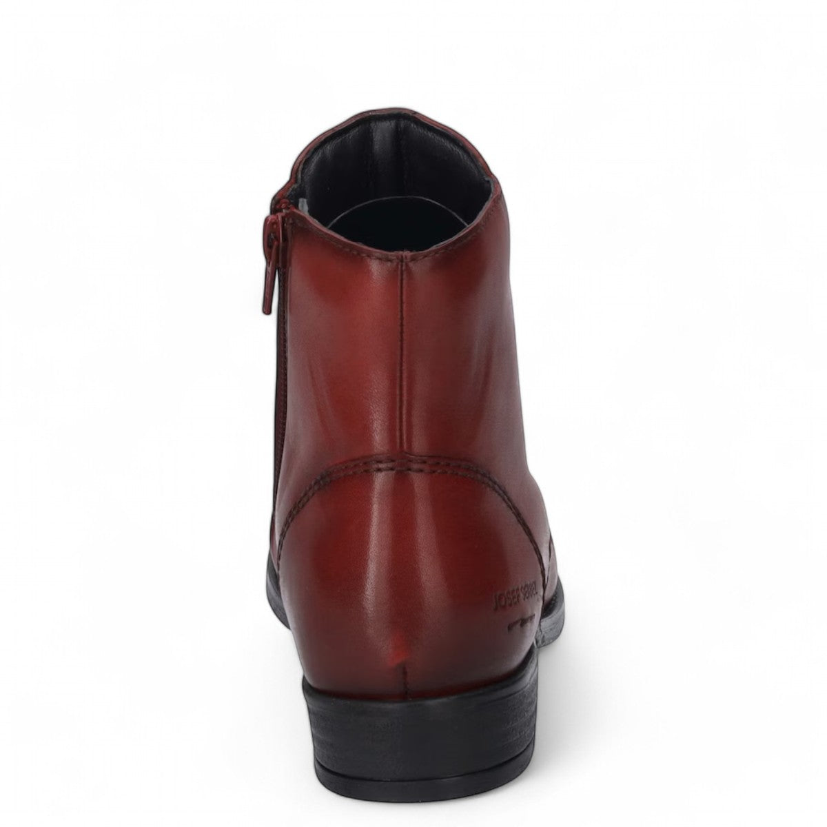 Josef Seibel Simona 04 red leather ankle boots with decorative front buttons and low stacked heel.
photo of the back.