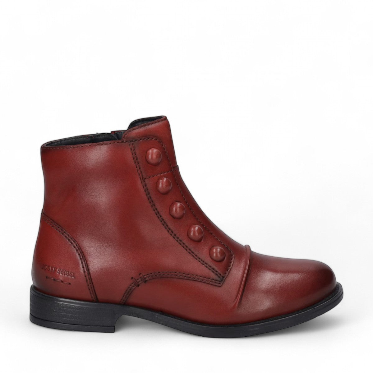 Josef Seibel Simona 04 red leather ankle boots with decorative front buttons and low stacked heel.
photo of the right side.