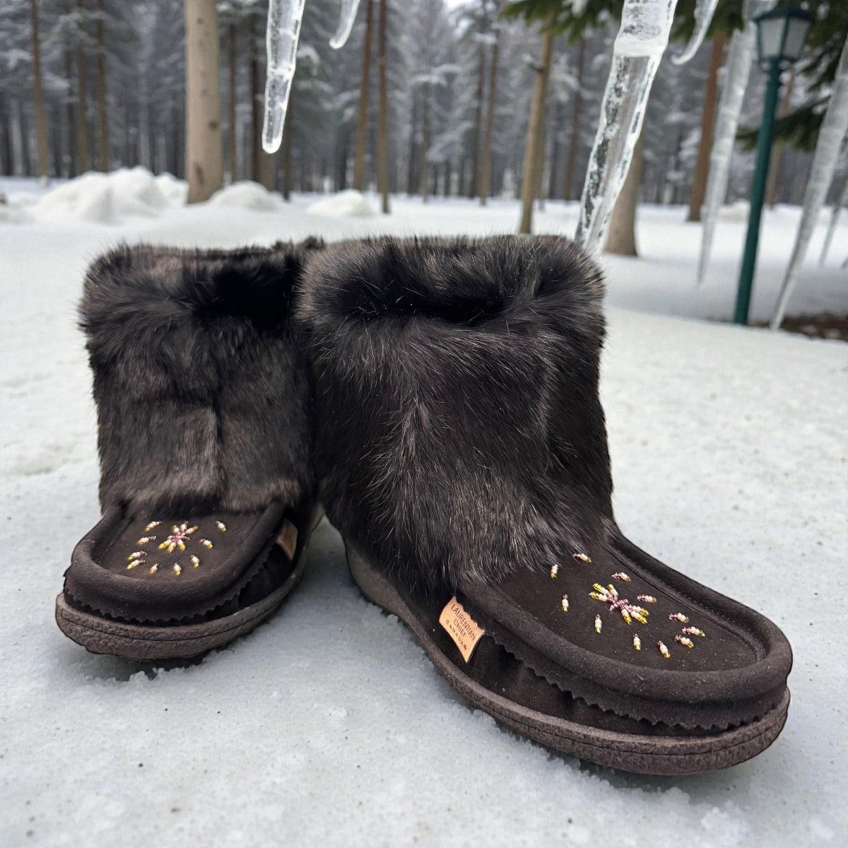 Laurentian Chief black waterproof suede mukluk with natural rabbit fur trim and durable crepe sole