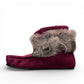 Laurentian Chief Nuka bordeaux suede moccasin with fur trim, beaded details, and black crepe sole.