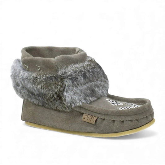 Laurentian Chief Nuka grey suede moccasins with faux fur lining and traditional beaded vamp design.