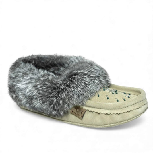 Laurentian Chief ice suede moccasins with rabbit fur trim and intricate beadwork for women.