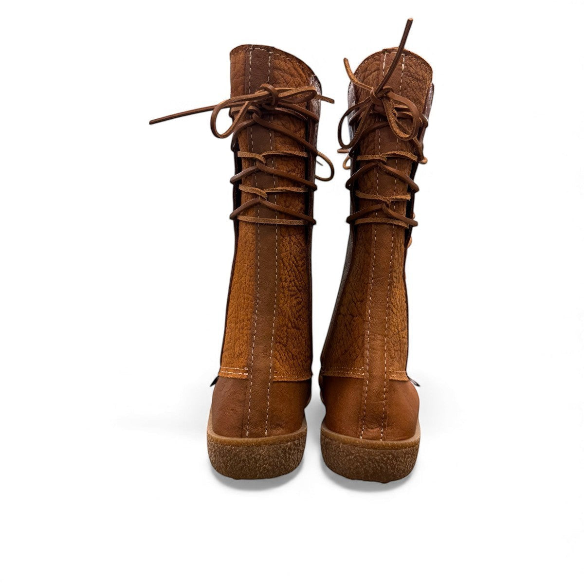 Laurentian Chief mukluk boots in cognac moose hide leather with lace-up front and moccasin stitching.