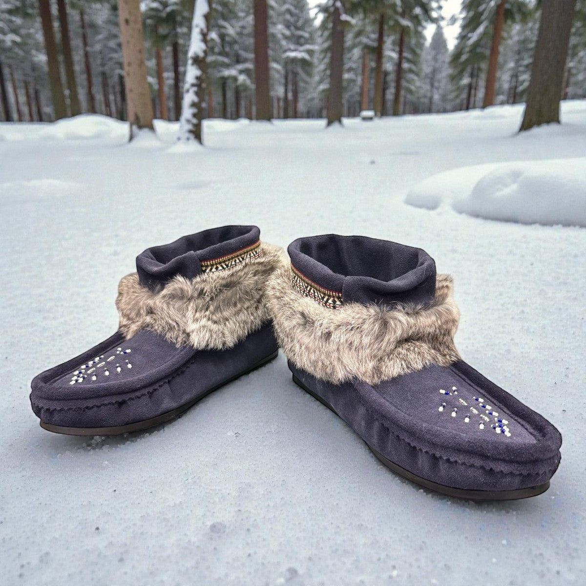 Laurentian Chief Nuka navy blue waterproof suede moccasin with fur trim and beaded detailing