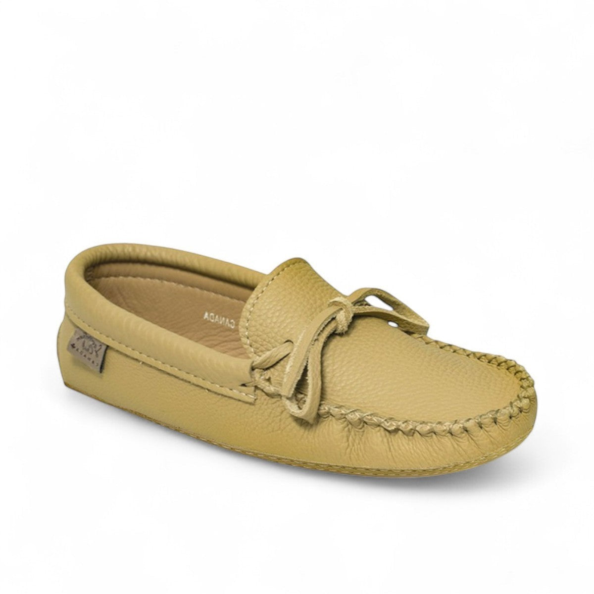Laurentian Chief tan leather moccasin with a soft sole and lace-up detail, handcrafted in Canada.