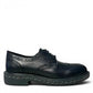 LUNA SOLE PINPIN black leather brogue derby shoe with a thick sole and white speckled welt detail. Photo of right side view.