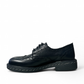 LUNA SOLE PINPIN black leather brogue derby shoe with a thick sole and white speckled welt detail. Photo of left side view.