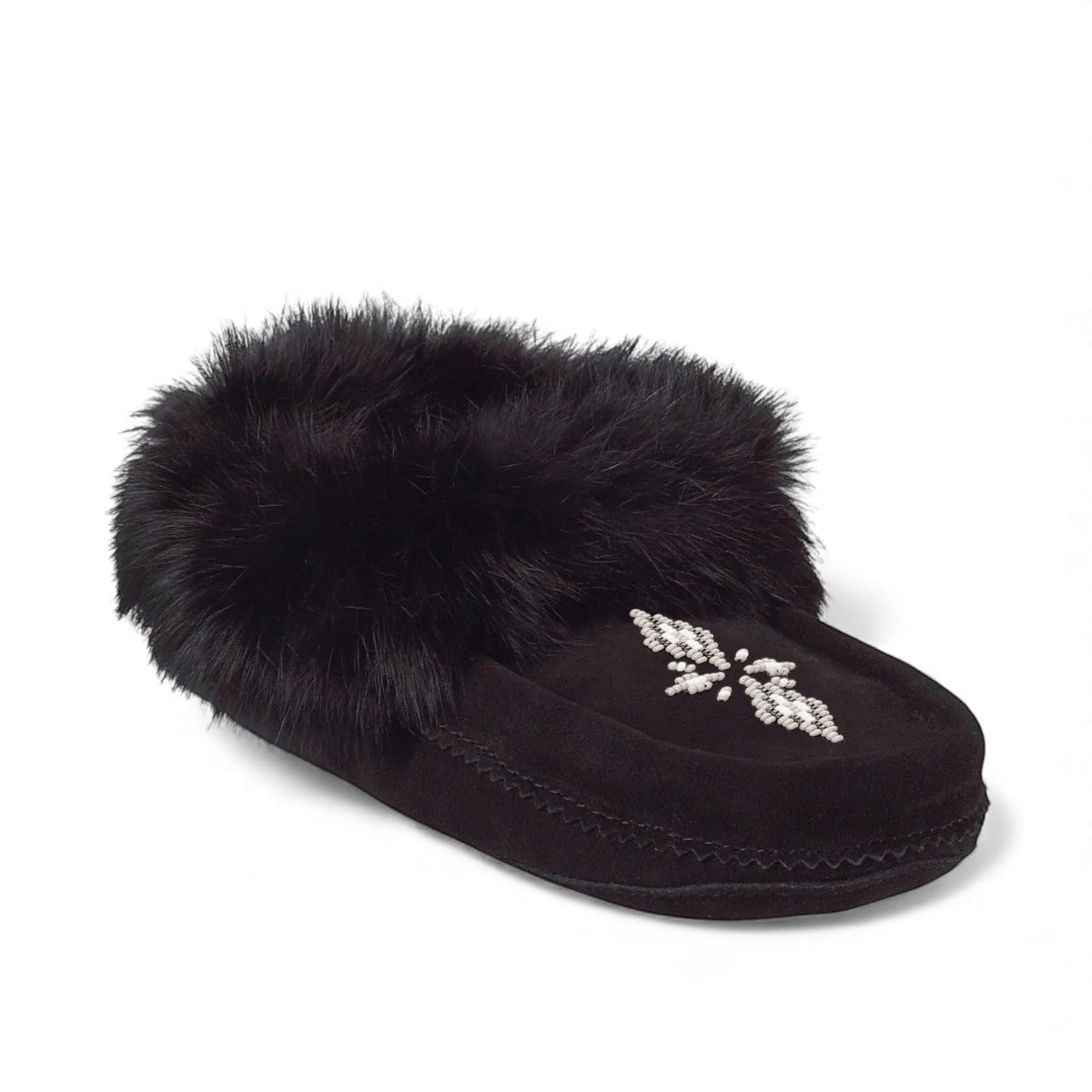 Manitobah black suede Tipi moccasin slipper featuring rabbit fur trim and intricate white beadwork