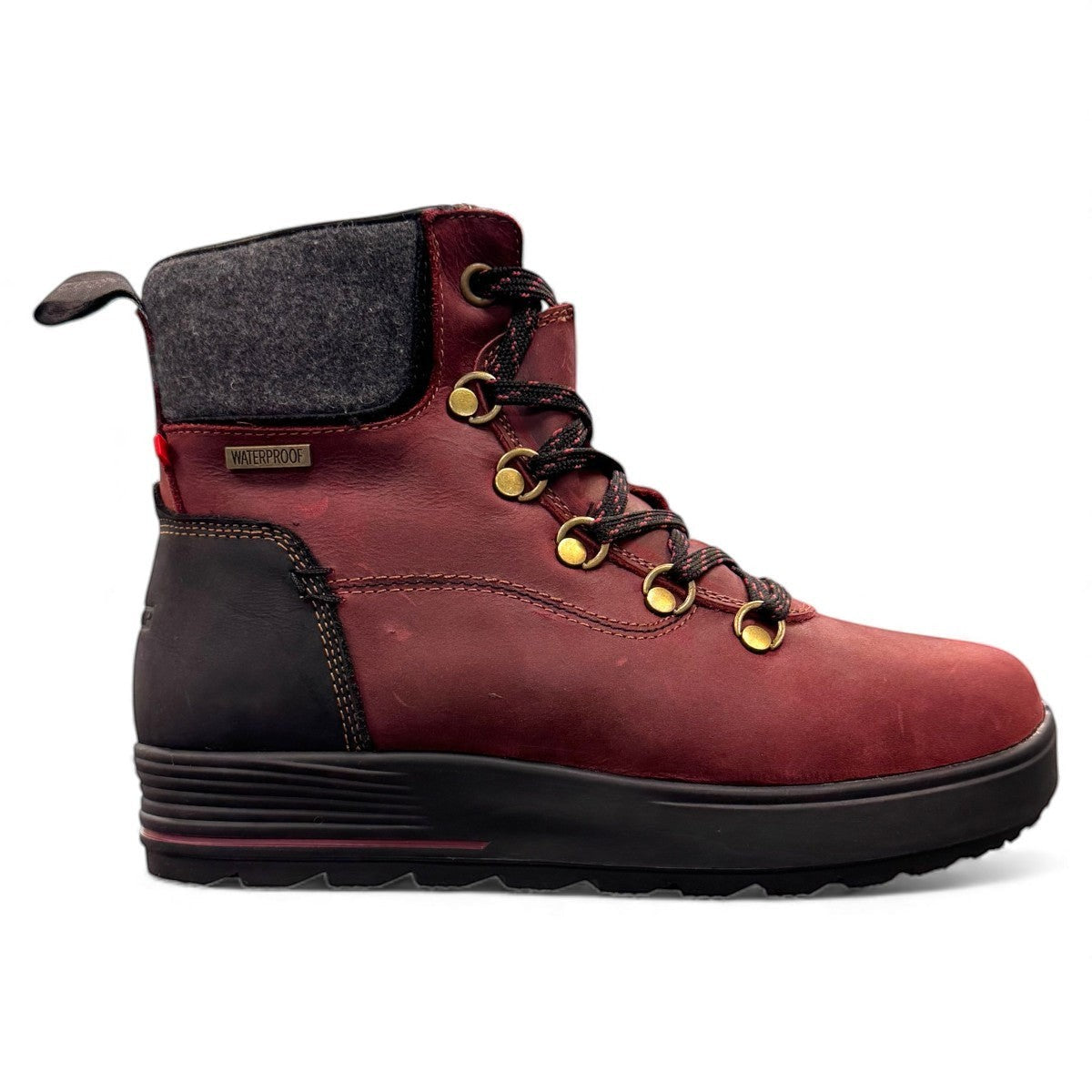 NEXGRIP Ice Jess burgundy leather winter boot with retractable cleat and waterproof zipper.
photo of the right side