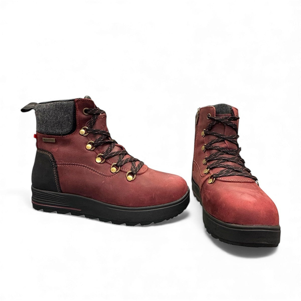 NEXGRIP Ice Jess burgundy leather winter boot with retractable cleat and waterproof zipper.
photo of the front side