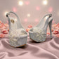 NIKPA ALEX white patent leather slingback platform heel with pearl and sequin floral embellishment